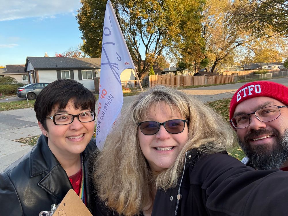 Kimiko and friends with an ETFO flag 