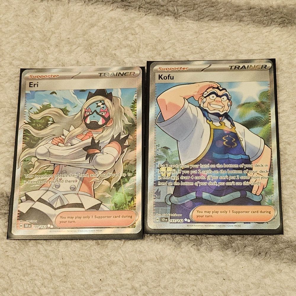 A photo of two Full Art Pokemon Trainer Cards showcasing Eri and Kofu with Twilight Masquerade Sleeves