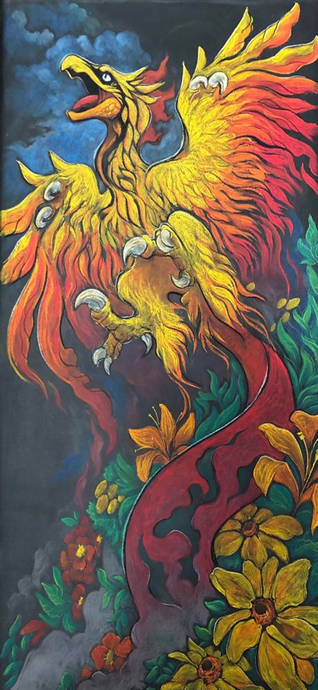 Chalk mural of a phoenix rising from its ashes, flowers blooming around it.