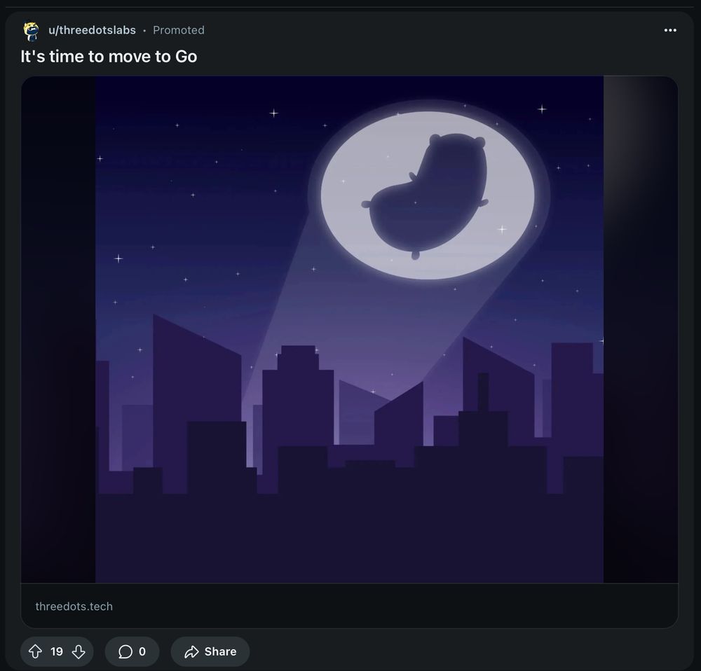 A cartoon image of a city scape at night. A light is projected into the air showing the image of, well, no idea. A bean with limbs and ears? A pillow maybe with 3 tags on it. No idea.
But it also has the tagline "It's time to move to Go".
