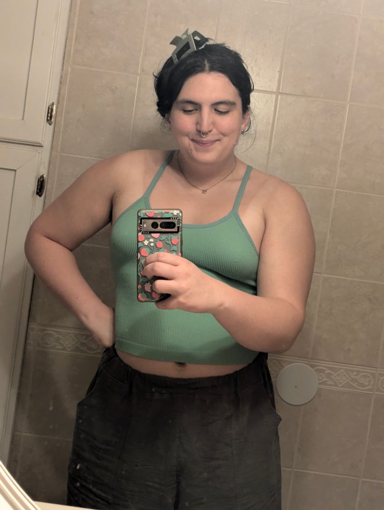 Radiance in a teal sports bra