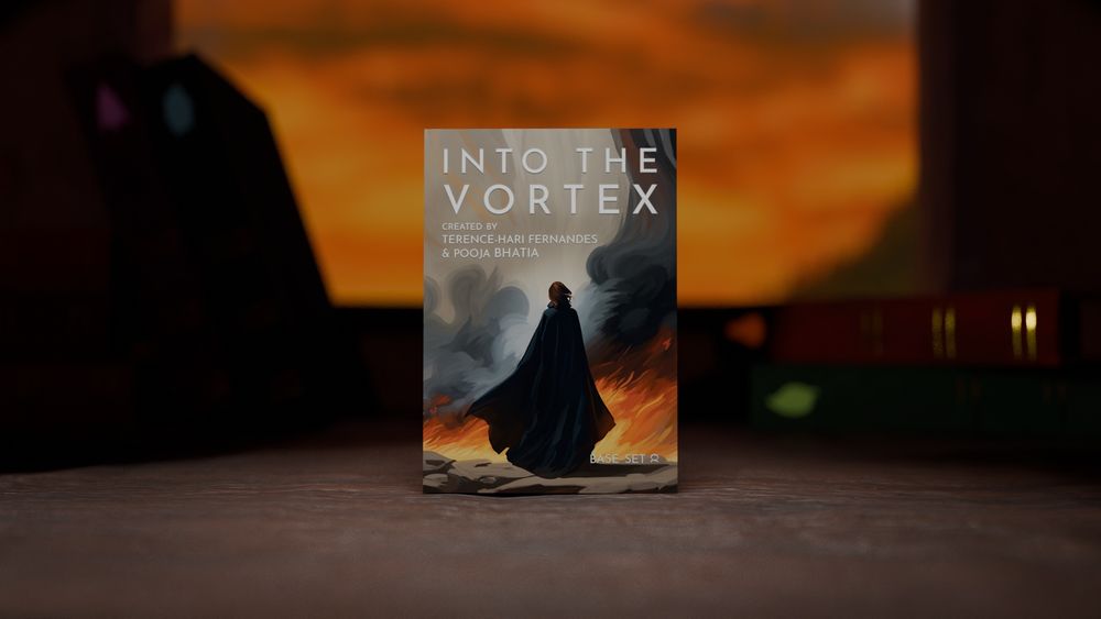 A picture of a box of a game called Into The Vortex with the name written on the cover as well as a picture of a person wearing a black, billowing cloak set on a wooden table with books strewn in the back against the backdrop of a window looking out at an orange sunset sky.