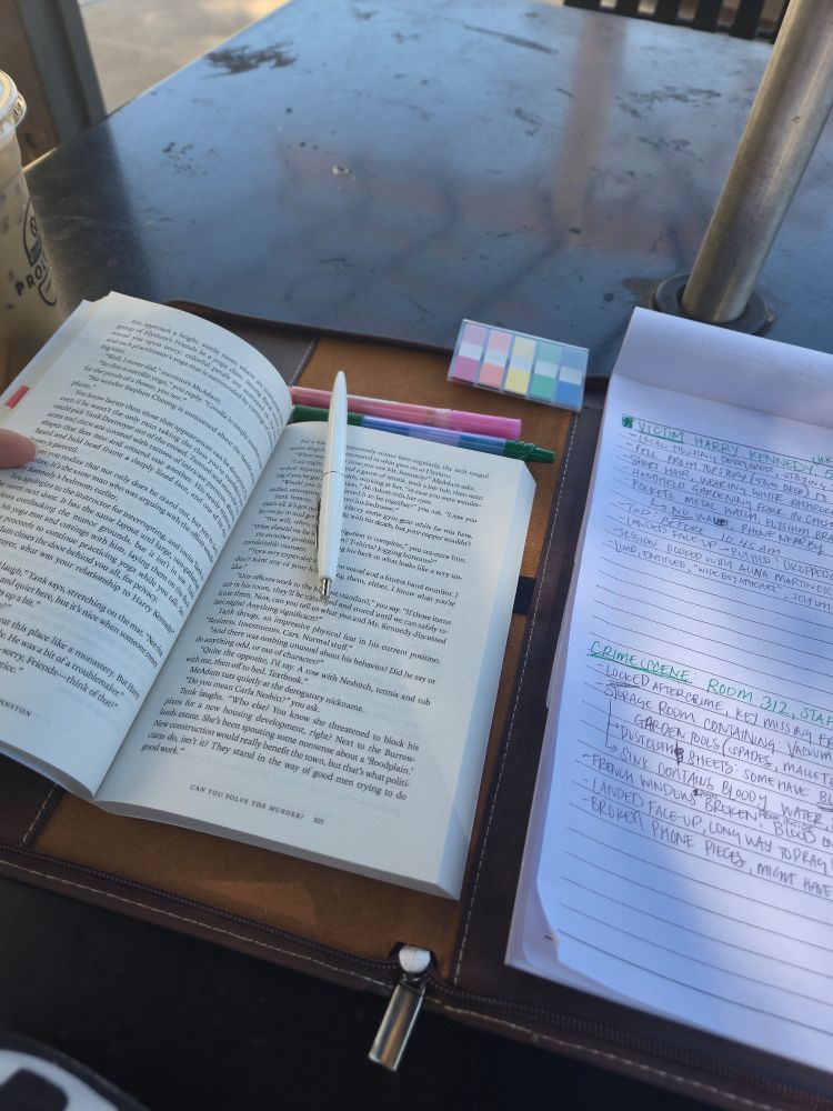 image of book open with pens, highlighter, sticky marks, next to a  notebook with two sections: "victim: Harry Kennedy" & "cringe scene: room 312" with various notes under each section