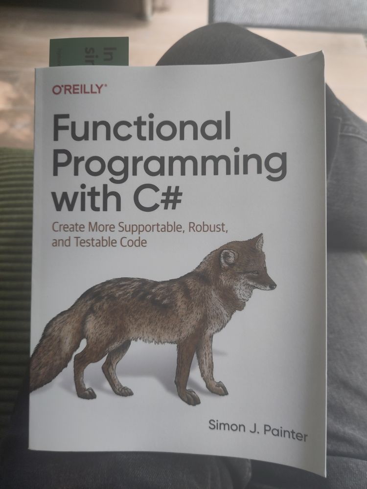 The cover of the book 'Functional programming with C#'.

