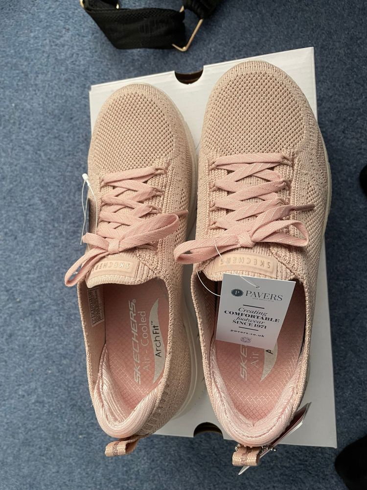 Shiny new pink gym shoes. 