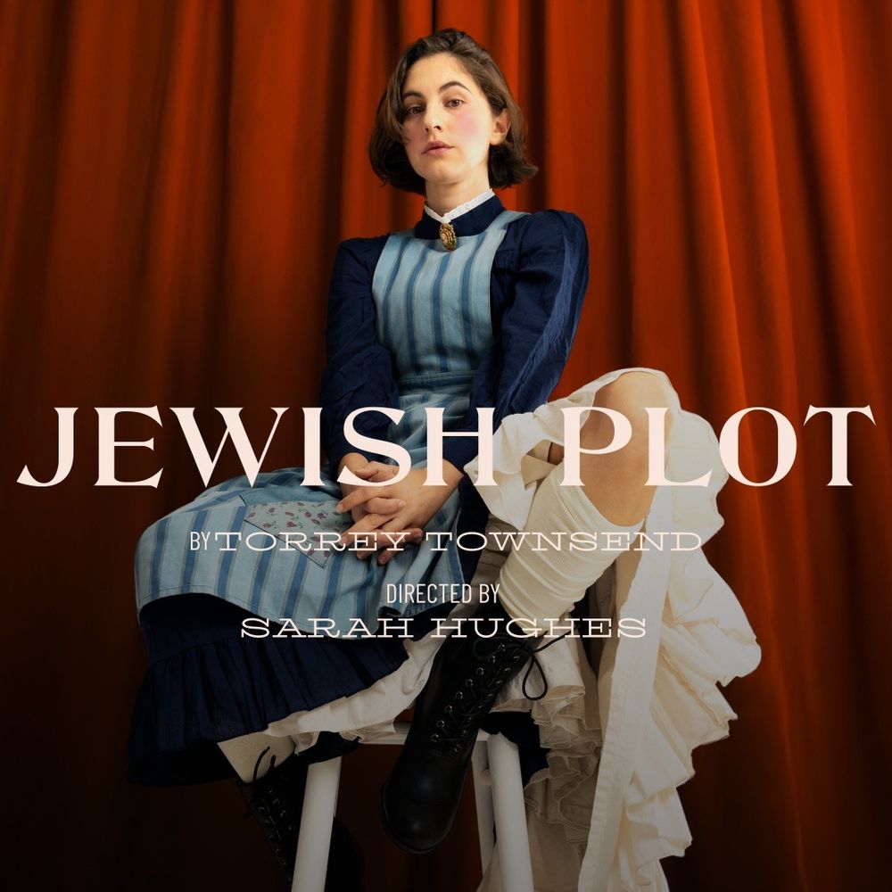 a poster for the play Jewish Plot; a woman in a high-necked nineteenth century dress sits on a stool in front of a red curtain