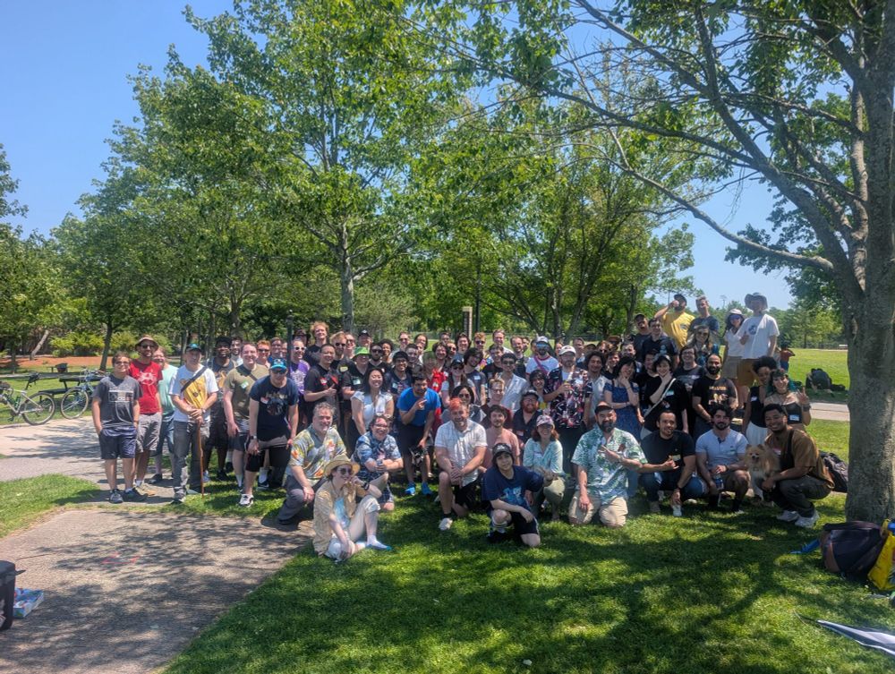 A big group photo of the BBQ attendees.