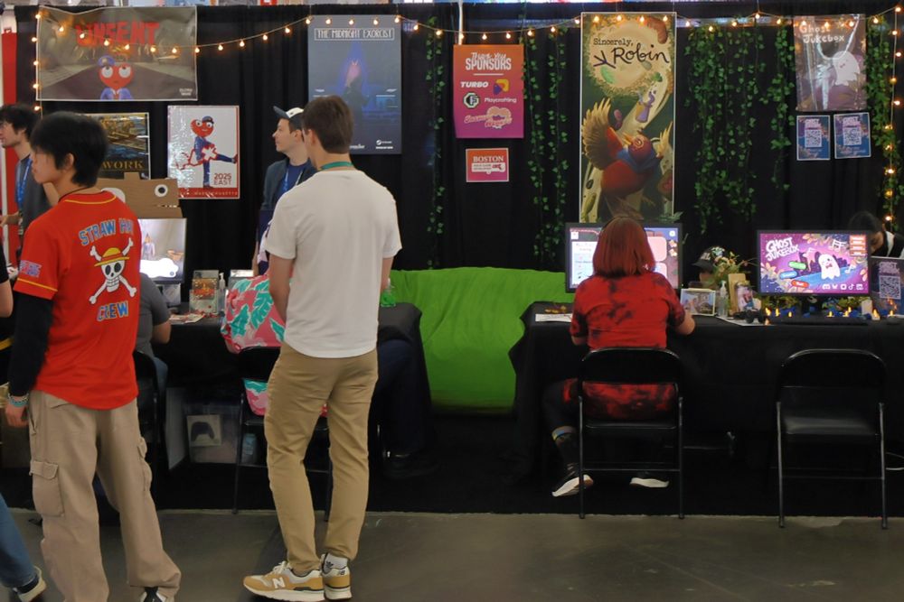 The Boston community booth at PAX. The games on display are "Unsent", "The Midnight Exorcist", "Sincerely, Robin" and "Ghost Jukebox".