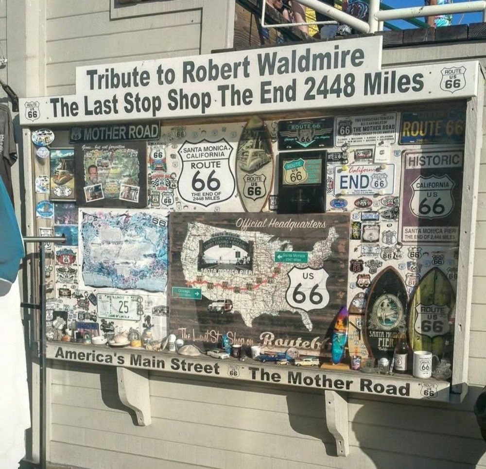 A sign marking the end of historic Route 66 on Santa Monica Pier in California 