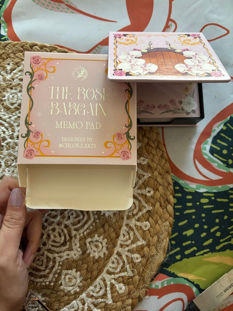 a memo pad based off of the book the rose bargain 