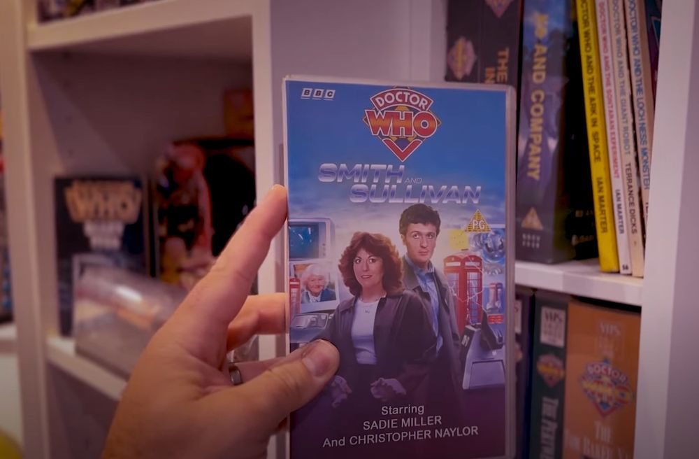 Front cover of the "VHS" shows the Smith & Sullivan artwork.
