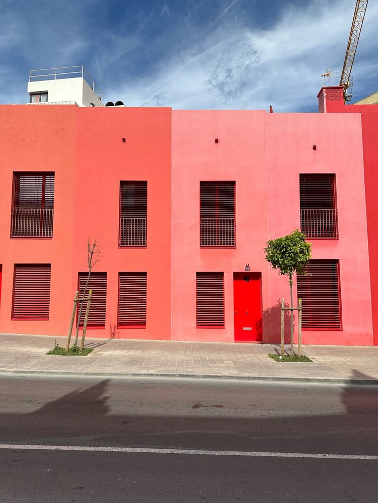 Two modern brightly coloured houses