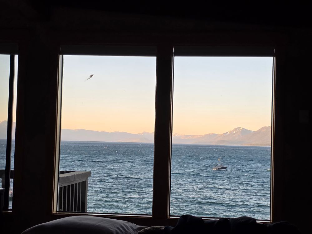 View from bed. Lake Tahoe at sunrise. 