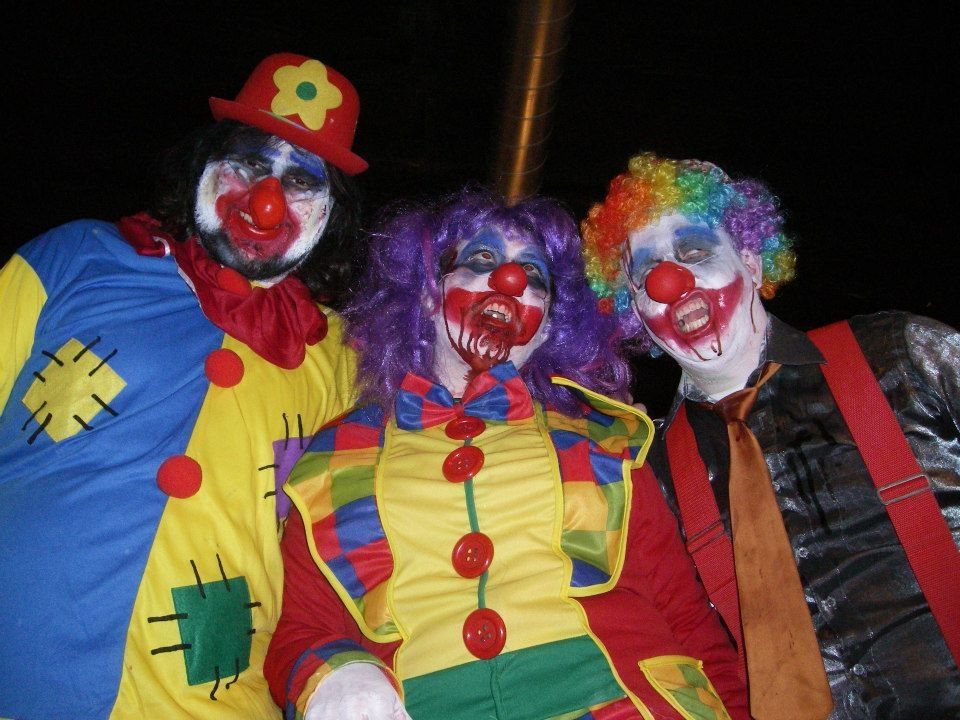 Three zombie clowns
