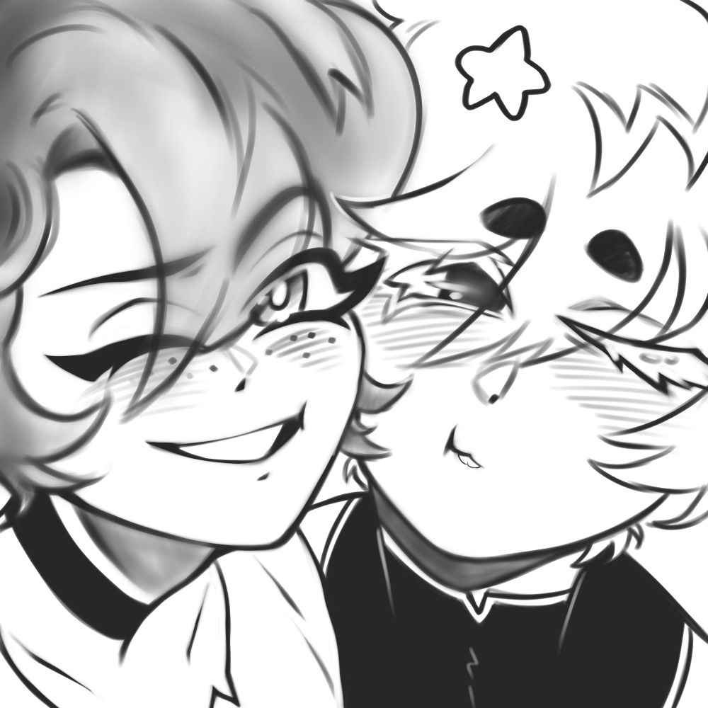 Cedar (left) & Lyra (right) squishing their faces together. 