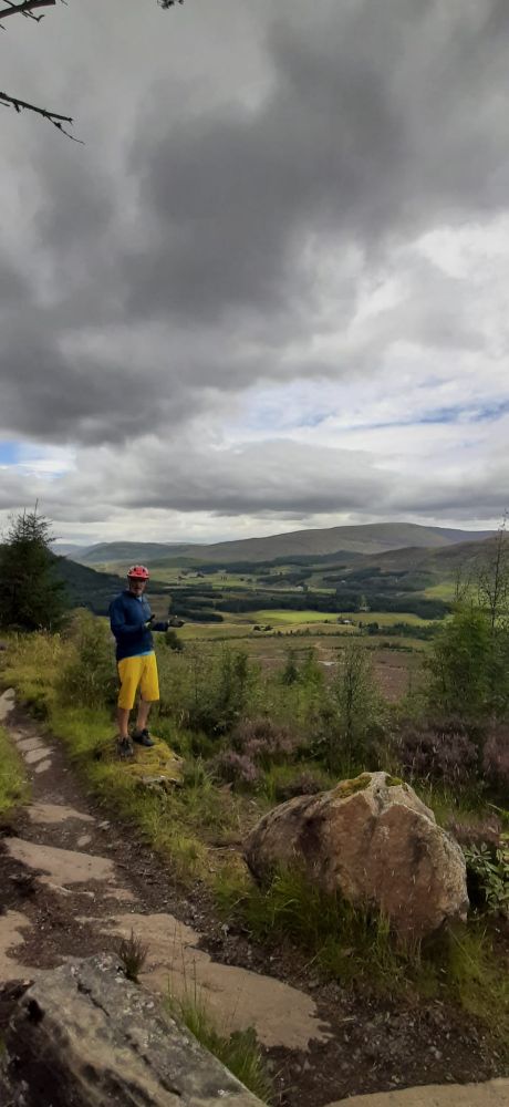 A man, standing in the way of a nice view.