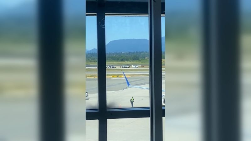 Stolen small plane circles Vancouver airport as controllers ground flights and pilots abort landings | CNN