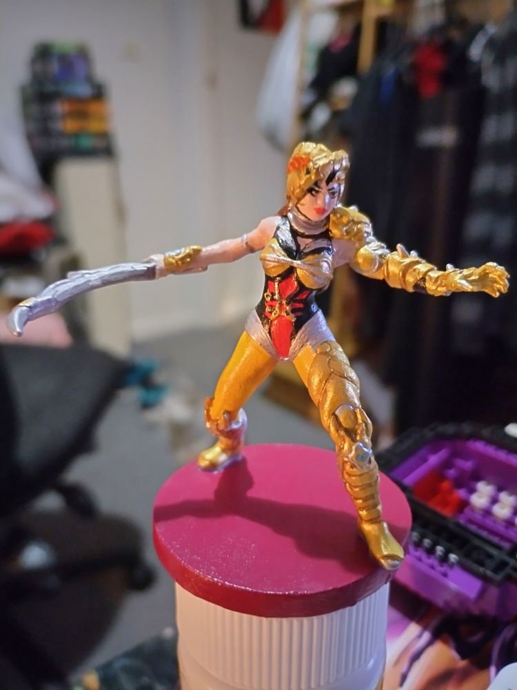 A miniature model painted by me of Scorpina from Power Rangers