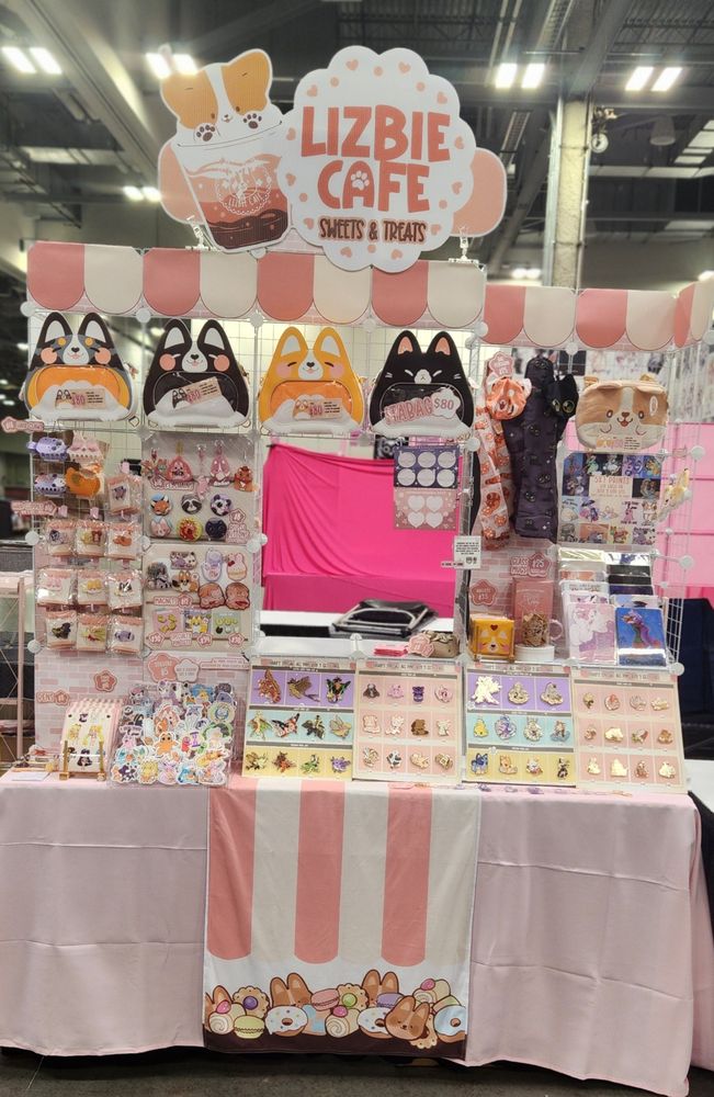 A photo of my merch table at Animate! Columbus