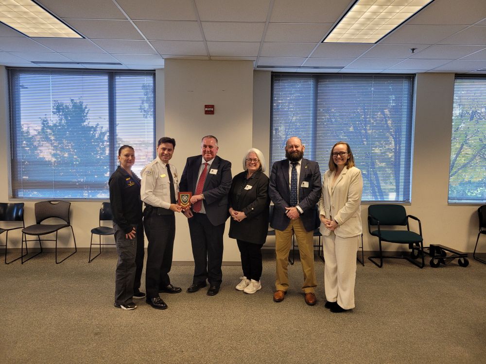Presenting PSNI plaque to Chicago Police Department Chief Angel Novalez and Executive Director Allyson Clark-Henson