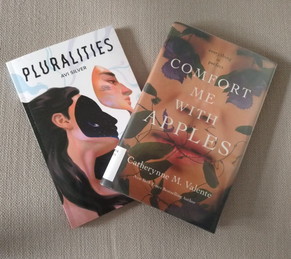 Books: Pluralities by Avi Silver and Comfort Me With Apples by Catherine M. Valente