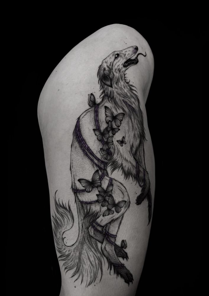 A big tattoo of a borzoi dog on a tight, hollow eyes, undead, wrapped in purple rope, with clusters of butterflies stuck to his body. 