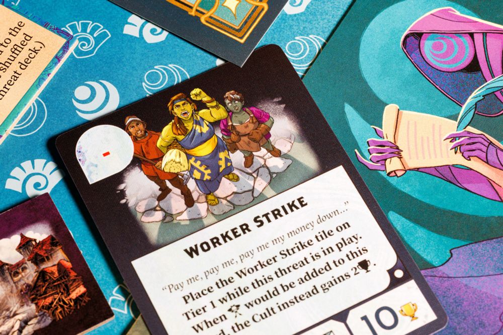Card, token and box art featuring fantasy characters on strike