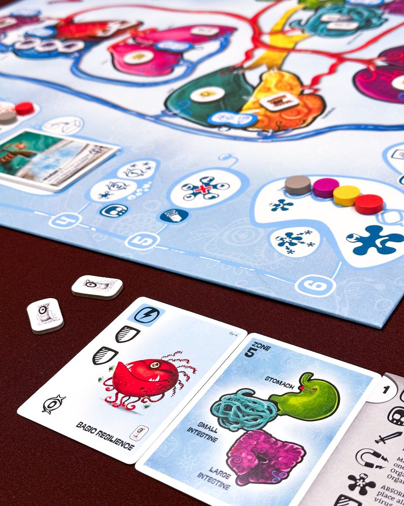 Cards and board featuring cartoon virus and organ art