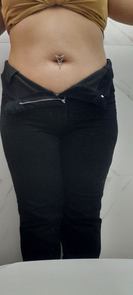 Piercing De um bigo com asas e corentinha