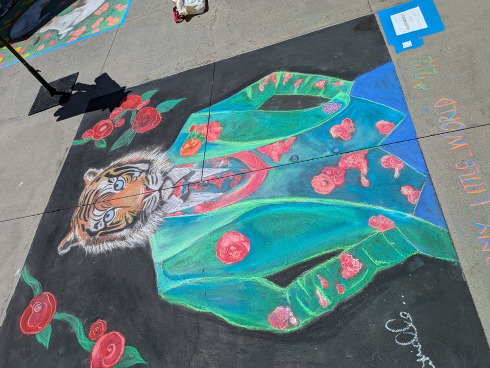 chalk portrait of a tiger in a suit with flowers 