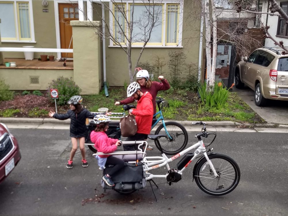 Our family of four on our two longtail cargo bikes 