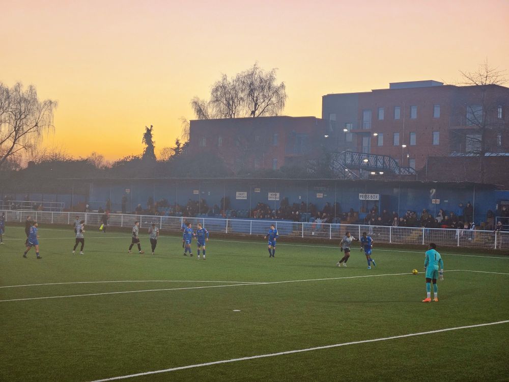 Goal kick at sunset