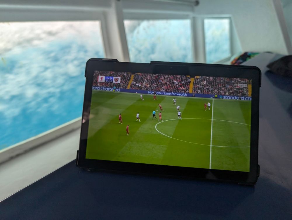 A football stream of Liverpool v West Ham on a boat