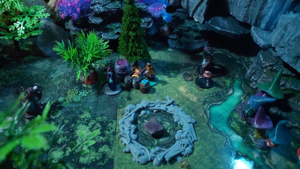 Merrix and his mercenaries watch as Minotaur brings a captive to sacrifice