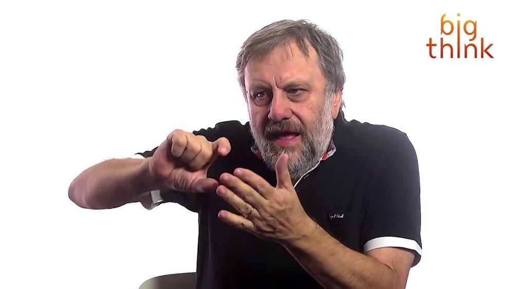 A screenshot of Slavoj Žižek from the video 'Slavoj Žižek on Synthetic Sex and "Being Yourself"'