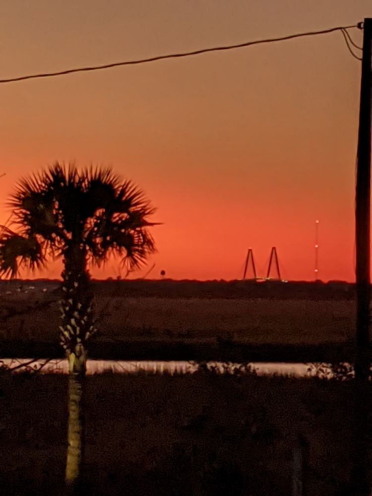Sullivan's Island sunset with Ravenel bridge in background.