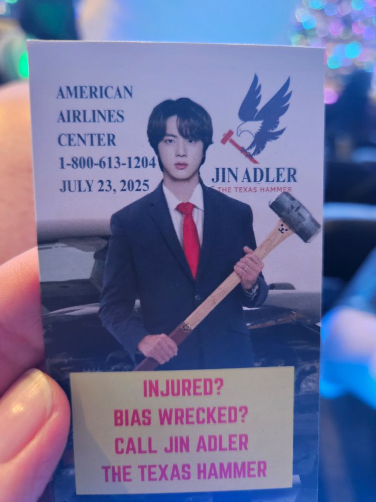 Business card with Jin in a suit holding a hammer with a typical PI ad slogan.
