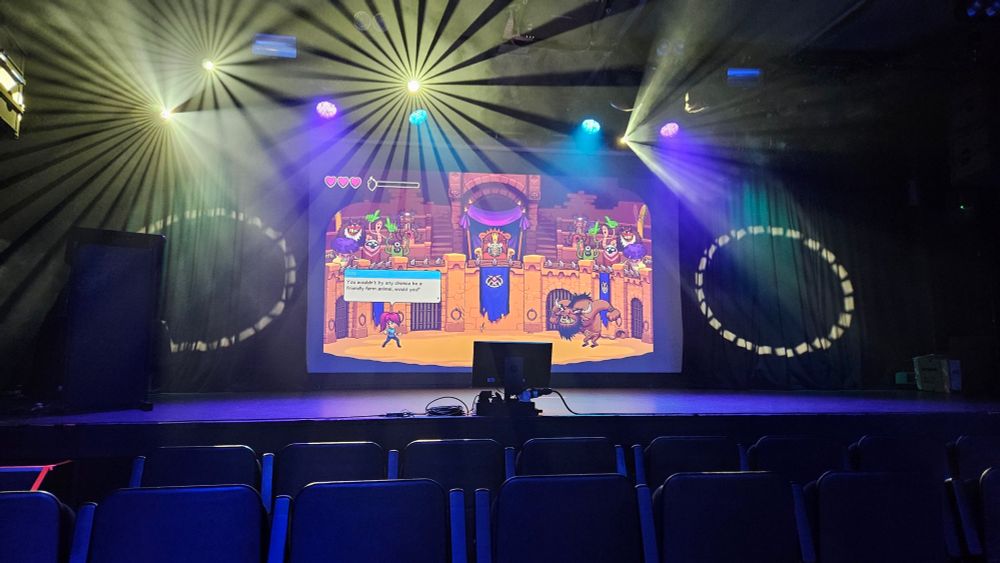 Game trailers being displayed at the Debug Indie Game Awards 2024