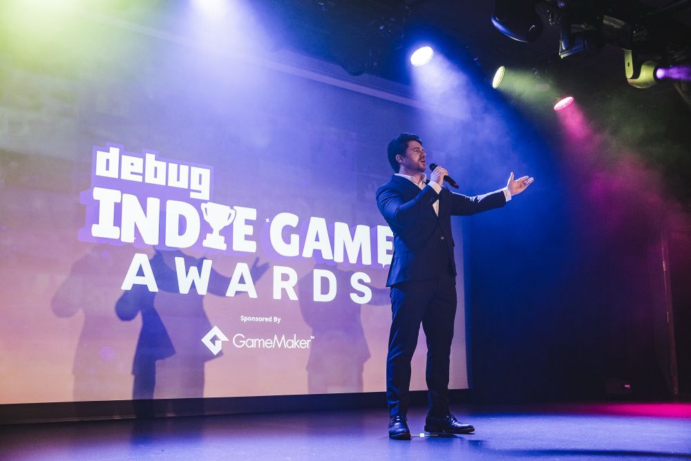 Josh Strife Hayes presenting the Debug Indie Game Awards 2025