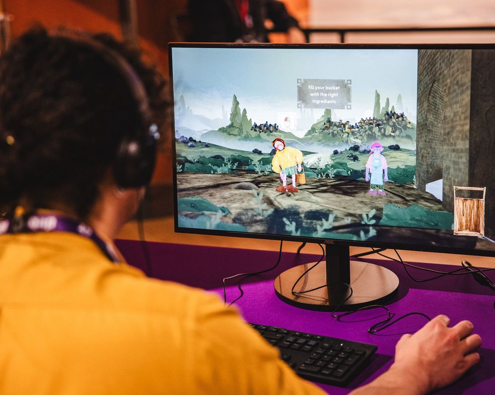 A person playing a video game on a PC