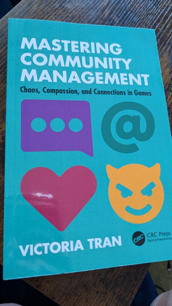 Photo of Victoria Tran's book "Mastering Community Management"