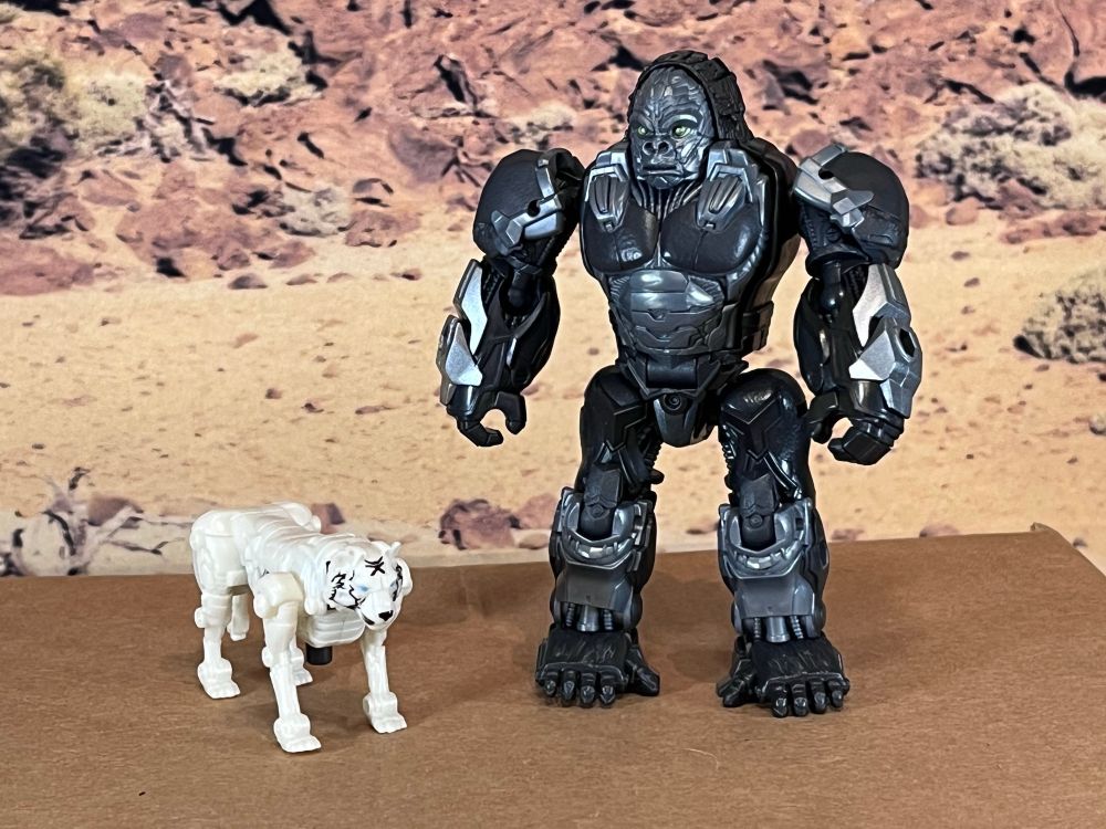 Arrowstripe, the white tiger and Optimus Primal the very upright robot gorilla