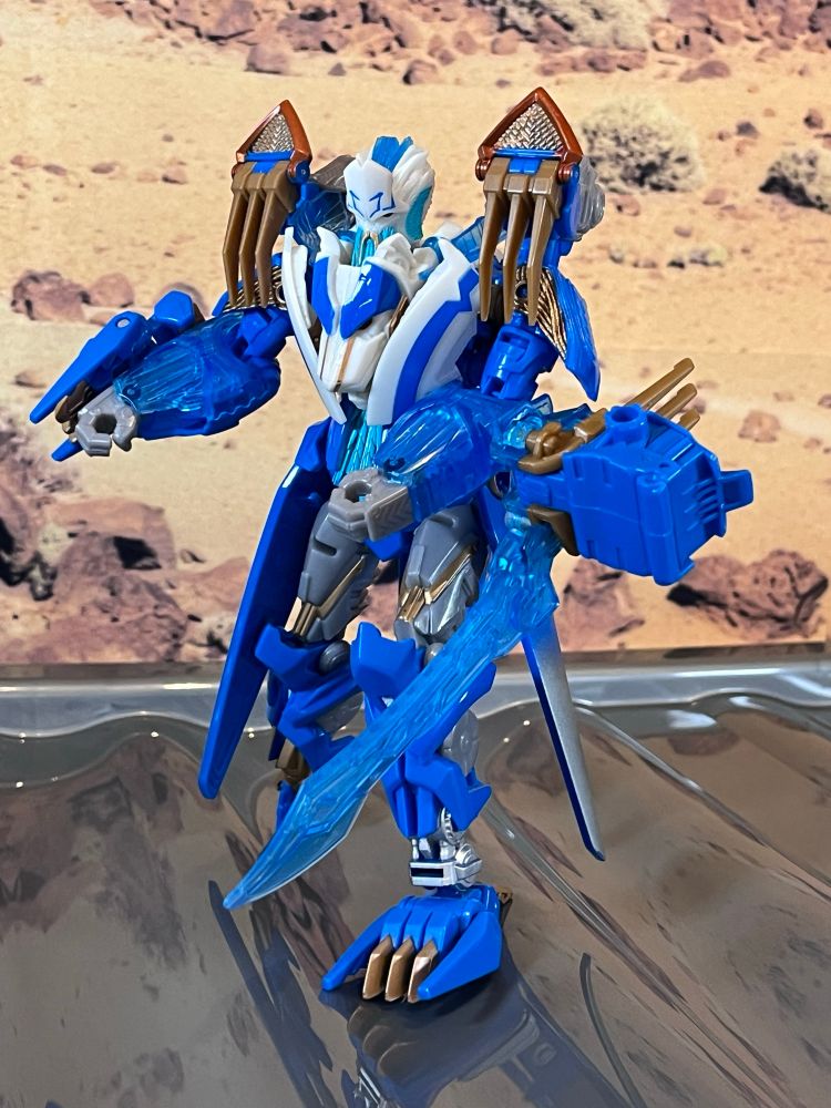 A Transformer toy: Thundertron, the peg leg Captain of the Star Seekers. He includes a flip out energon cutlass which lights up