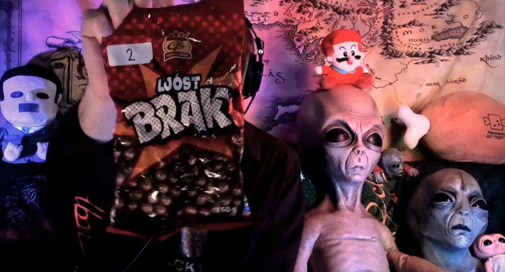 Vinesauce Vinny holding up a bag of Icelandic "Wost Brak" candy 