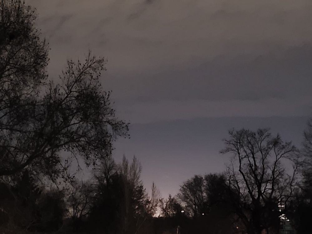Late evening photo from South Denver, clouds suppressing most of the aurora effect
