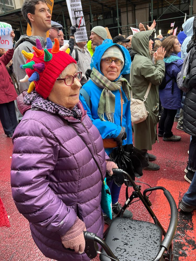 Two elder women protesters at the Hands Off march on April 5 in NYC