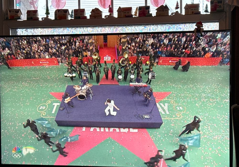 Just a platform on wheels. A band is playing on it. It has literally no decoration.