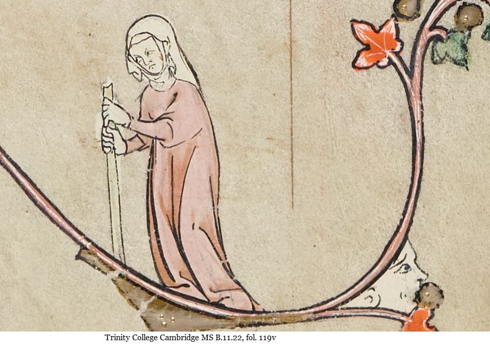 woman wearing pink and looking irritated