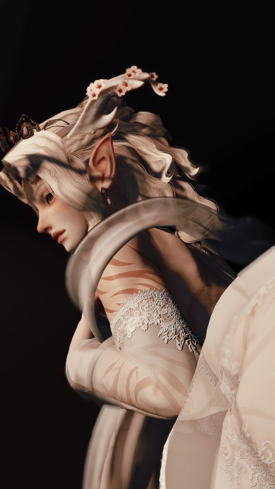 sumire turning, from a lower angle. their hand is on their chest. there is sheer fabric around their shoulders and on their gloves.