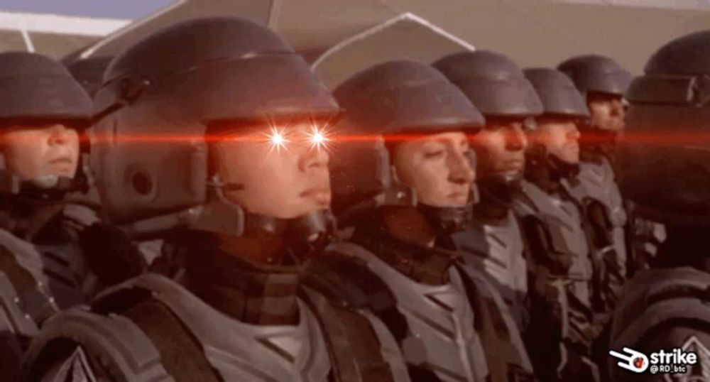 a group of soldiers are standing in a line and their eyes are glowing brightly